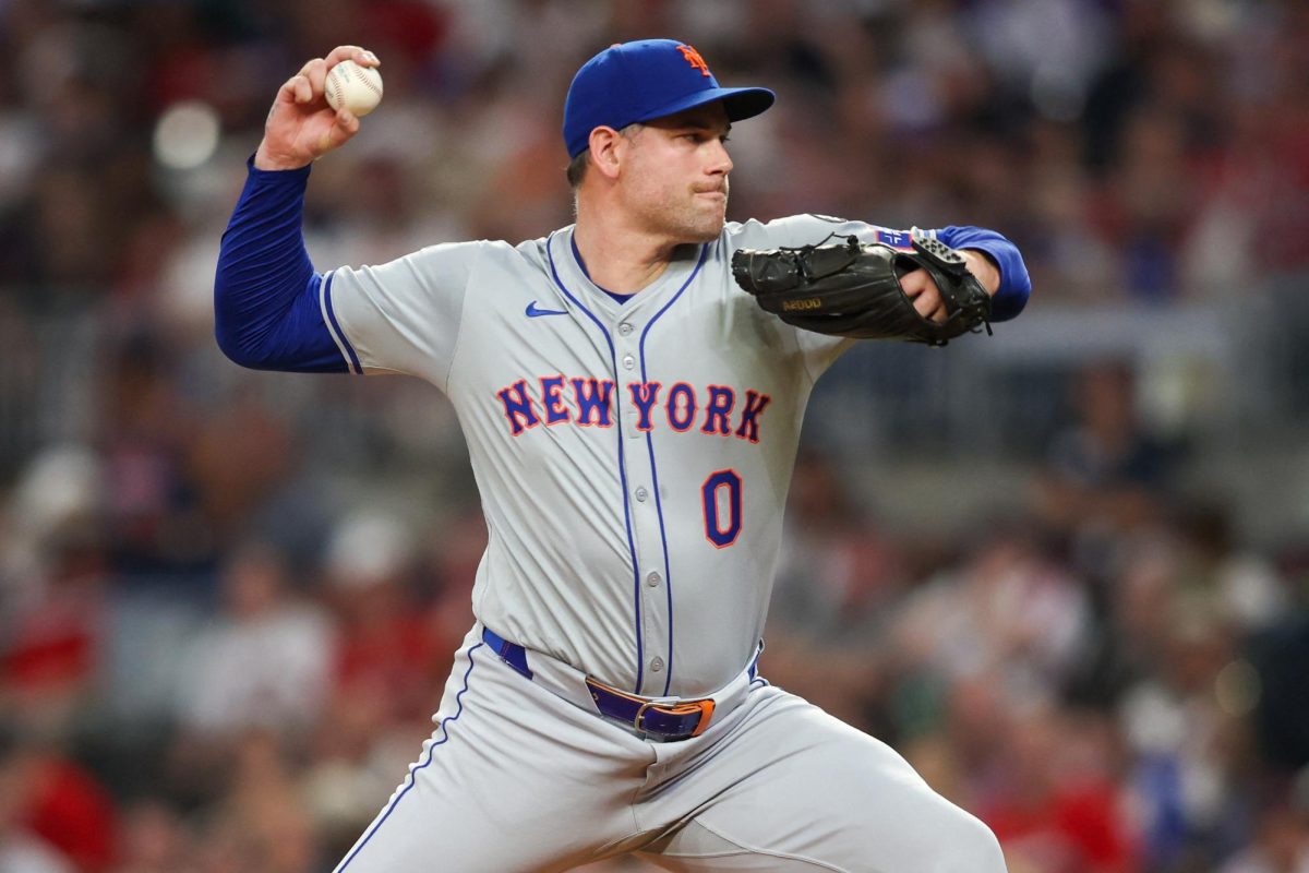 New York Mets relief pitcher Adam Ottavino (0) throws against the Atlanta Braves in the seventh inning at Truist Park. Mandatory Credit: Brett Davis-Imagn Images