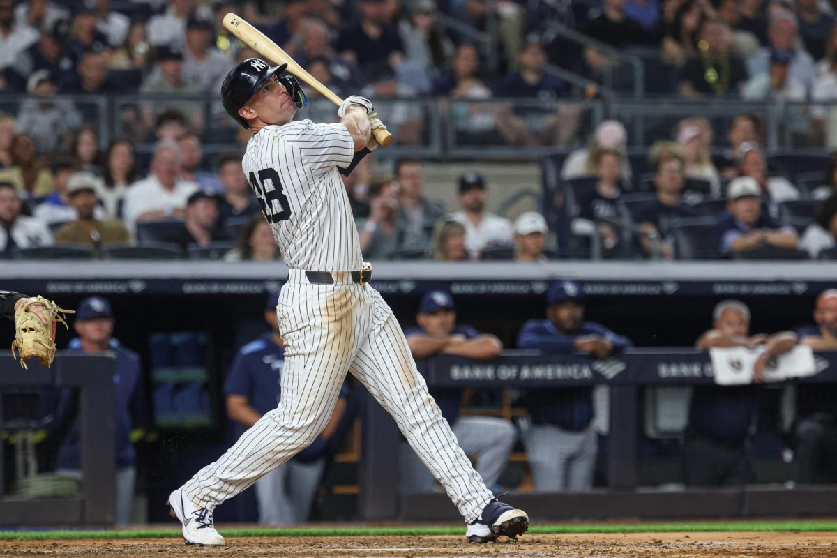 New York Yankees first baseman Paul Goldschmidt hits a three run home run during the fifth inning against the Tampa Bay Rays at Yankee Stadium. Vincent Carchietta-Imagn Images