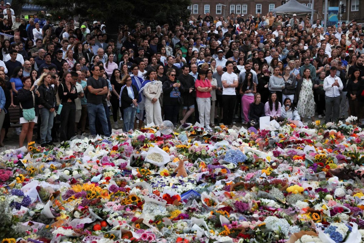 People pay respects at Bondi Pavilion to victims of a shooting during a Jewish holiday celebration at Bondi Beach, in Sydney, Australia, December 15, 2025. REUTERS/Hollie Adams