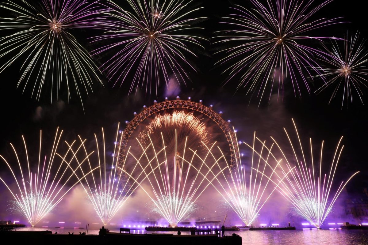 Fireworks explode over the London Eye Ferris wheel to mark the New Year's celebrations, in London, Britain, January 1, 2026. REUTERS/Maja Smiejkowska