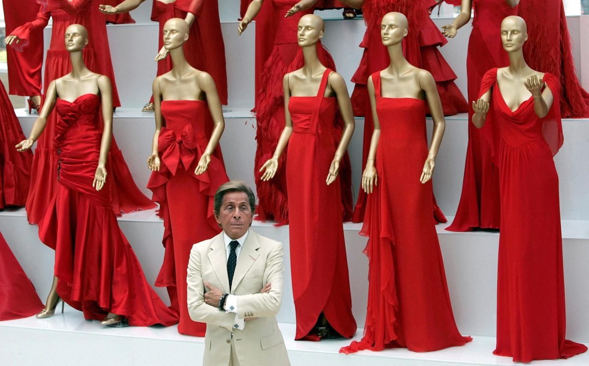 Veteran Italian fashion designer Valentino Garavani poses during the opening of his exhibition at the Ara Pacis Museum in Rome July 6, 2007. Valentino will snub Paris and unveil his latest haute couture collection in Rome to mark his 45th year in the city where he got his start.  REUTERS/Alessandro Bianchi (ITALY)