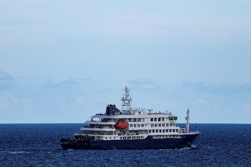 The cruise ship MV Hondius, affected by a hantavirus outbreak, leaves the port of Granadilla de Abona, in Tenerife, Spain, May 11, 2026. REUTERS/Hannah McKay