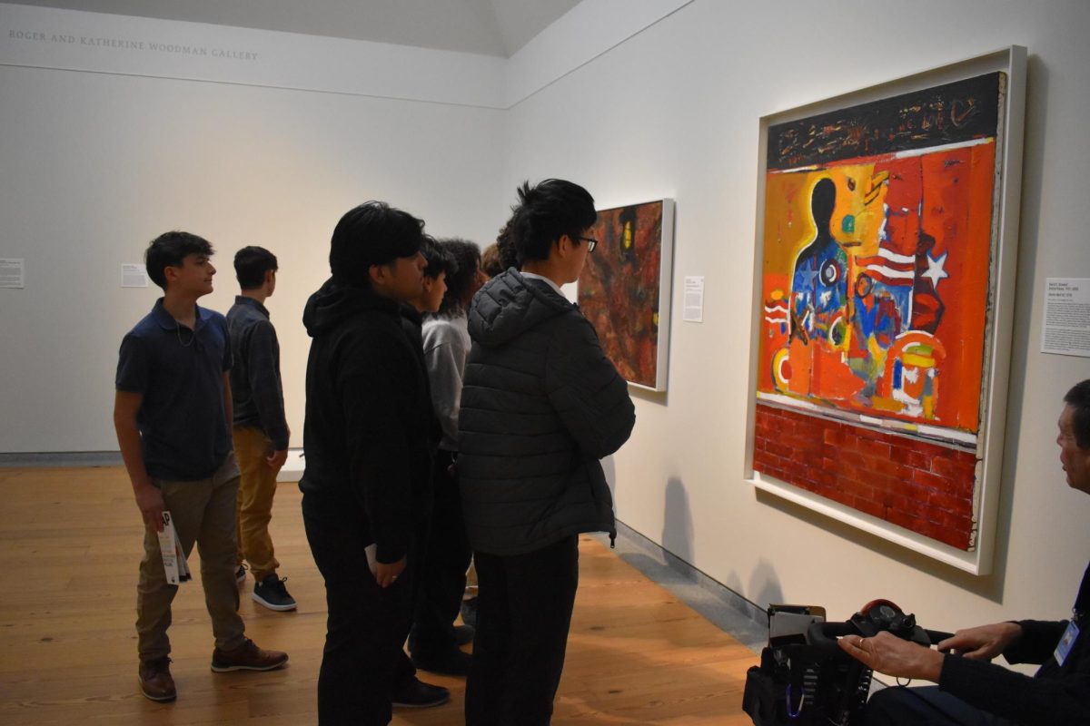 Students admiring works at the Portland Museum of Art.
